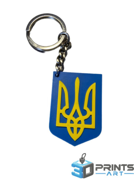 Брелок у формі герба з отвором під кільце для ключів
